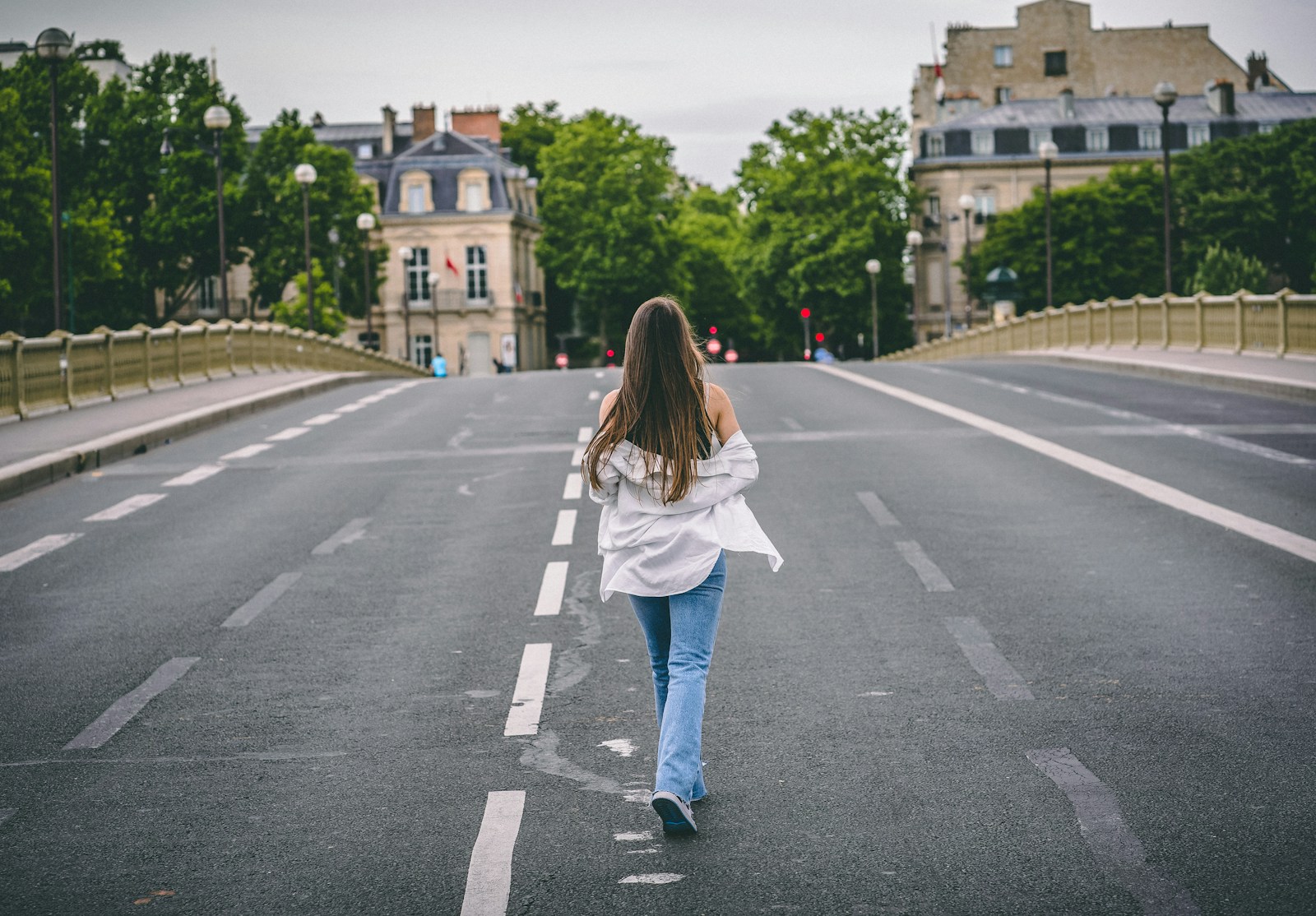 a person walking across a street