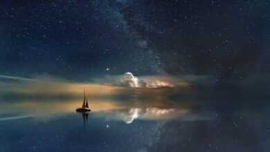 black sailing boat digital wallpaper