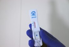 white and blue plastic device